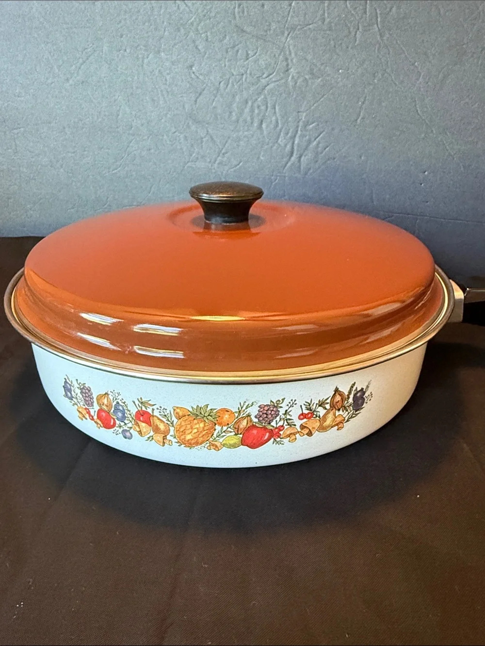 1970s enamelware skillet  featuring a retro “Spice of Life” motif.
